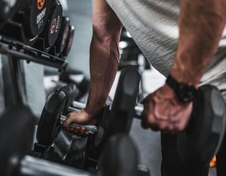 man lifting weights